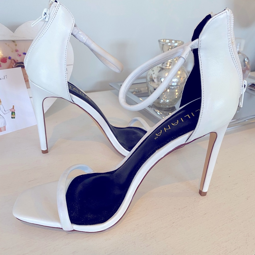 LULUs White strappy heel never worn